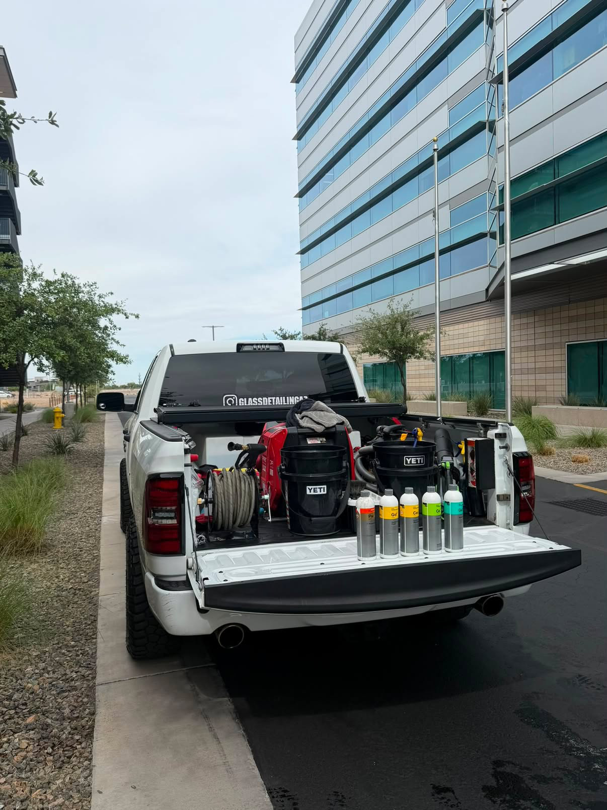 Back of the mobile detailing rig stocked with tools and products